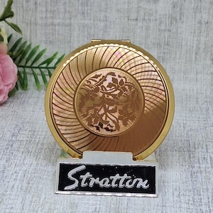 Stratton Compact ~ Gold Tone with Shiny Flowers and Curved Lines