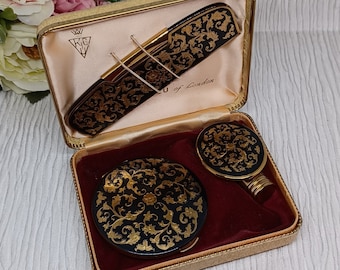 Kigu Compact Flippy Lipstick and Comb Set in Black with Gold Scroll Work ~ In Original Box ~ Mid Century Vintage