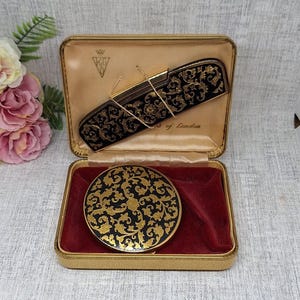 Kigu Compact and Comb Set in Black Enamel with a Gilt Scroll Work Pattern ~ In Original Box ~ Mid Century Vintage