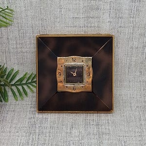 May include: A rustic wooden sign with the text "Welcome to our home" in a handwritten style. The sign has a distressed finish and a simple, inviting design, suitable for a front porch or entryway.