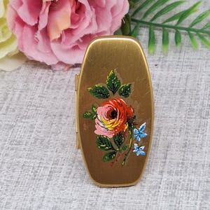Support de rouge à lèvres mascotte vintage doré avec des fleurs roses roses et bleues ~ Lipview