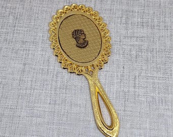 Espejo de mano vintage en tono dorado con camafeo de una dama ~ Espejo de tocador