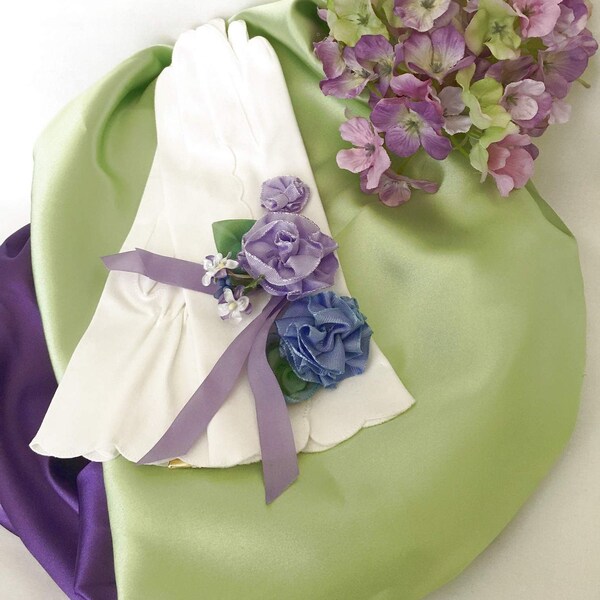 Vintage gloves accented with handmade ribbon flowers and vintage millinery flowers