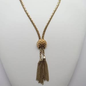 Vintage Corocraft ajustable diapositiva y borla collar