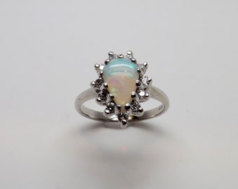 Stunning 10K WG .50 ct Genuine Pear Opal surrounded by 1/4 ct TW CZ Ring/ Dinner Ring/ Statement Ring Size 6.5 Weighs 2.94 grams