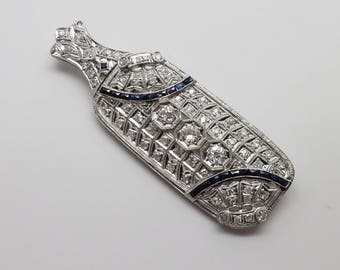 Gorgeous Edwardian Platinum Diamond and Sapphire Pendant / Brooch/ Pin, circa 1920.