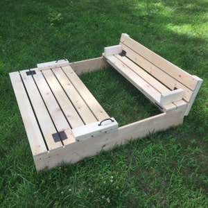 Local item only - NO SHIPPING Sandbox with folding cover and built-in benches