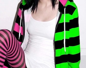 May include: A zip-up hoodie featuring horizontal black and neon green stripes on one side and black and hot pink stripes on the other, worn over a white tank top with black and pink striped tights and black and green striped tights.