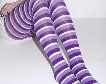 May include: Opaque tights featuring a repeating horizontal striped pattern in alternating shades of deep purple, light violet, and white. The hosiery covers the legs from the upper thigh down to the toes, maintaining a consistent striped design throughout.