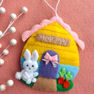 May include: A set of three ceramic mugs with a speckled, matte finish. The mugs are in shades of gray, white, and black. Each mug has a simple, modern design, suitable for coffee or tea.