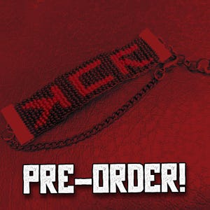 May include: Black and red beaded bracelet with the word "ZACK" in red letters. The bracelet has a chain and clasp closure. The background is a textured red surface. The text "PRE-ORDER!" is displayed in white.