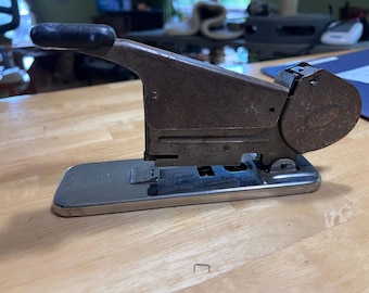 Vintage Bates Model B stapler loaded with wire.  Extra boxes of wire.