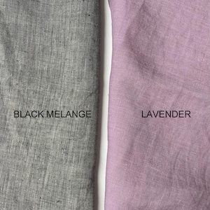 May include: Two fabric swatches, one black with a subtle melange texture and the other a light lavender color. The swatches are labeled "Black Melange" and "Lavender".