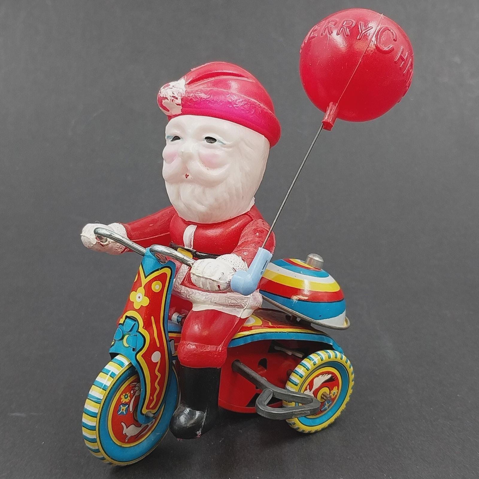 1950s Suzuki Celluloid Santa Claus Wind-up Toy on Tin Tricycle