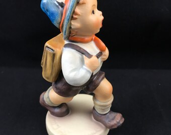 hummel boy with backpack