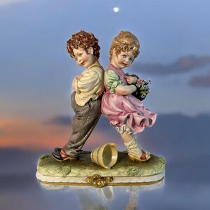 VINTAGE AURO BELCARI 1987 SIGNED FIGURINE STATUE BOY PLAYING
