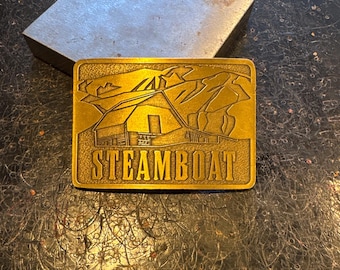 Steamboat Springs Skiing Brass belt buckle 3"x2"