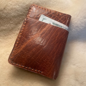 Cartera plegable de piel de bisonte