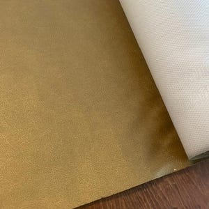 Bronze gold leather textured faux leather by the yard
