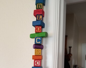 Blockchain made of Vintage Painted Wooden Children's Building Blocks and Alphabet Blocks