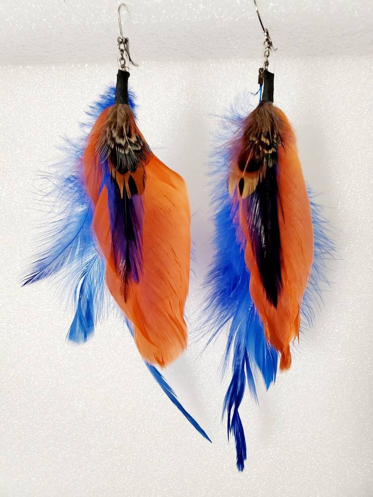 Blue and orange feather earrings Etsy