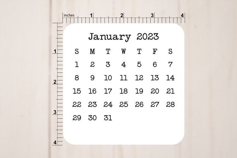 May include: A white calendar with the month of January 2023 printed on it. The calendar shows the days of the week, Sunday through Saturday, and the dates for each day of the month.