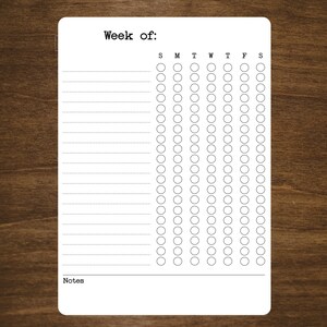 May include: A printable weekly planner with a blank space for the week of, a grid of days of the week, and a notes section.