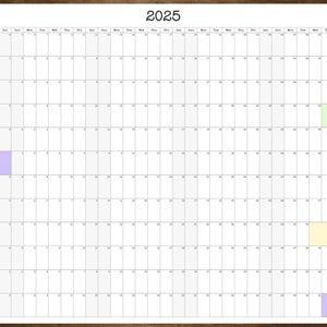 May include: A printable 2025 calendar with a wooden frame. The calendar is divided into 12 months, with each month represented by a different color. The colors are: January - light blue, February - pink, March - yellow, April - light green, May - green, June - purple, July - light blue, August - pink, September - yellow, October - light green, November - green, December - purple.