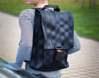City backpack with extraordinary closure - BLK 48-17, buckle, laptops, upcycled