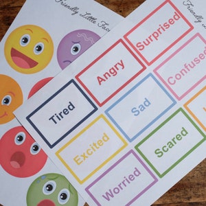 May include: A set of colorful cards with different emotions printed on them, including happy, sad, angry, tired, excited, worried, scared, surprised, and confused. The cards are designed to help children learn about and express their emotions.