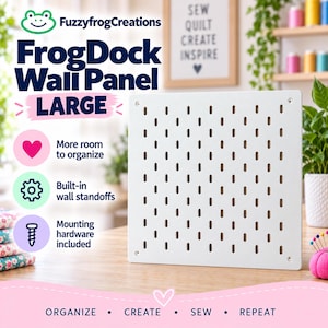 May include: A large white square pegboard wall panel with vertical slots, labeled FrogDock Wall Panel Large by FuzzyfrogCreations. Features include more room to organize, built-in wall standoffs, and mounting hardware included. Text reads: ORGANIZE, CREATE, SEW, REPEAT.