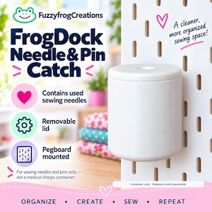May include: A white cylindrical FrogDock Needle & Pin Catch container with a removable lid, designed for pegboard mounting. The text reads: FrogDock Needle & Pin Catch, Contains used sewing needles, Removable lid, Pegboard mounted, A cleaner, more organized sewing space!, For sewing needles and pins only — not a medical sharps container., Container only - Pegboard sold separately, ORGANIZE • CREATE • SEW • REPEAT.