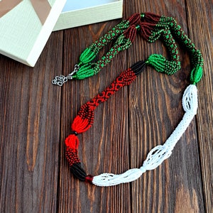 Orula Beaded Necklaces obatala and esu and half black and red