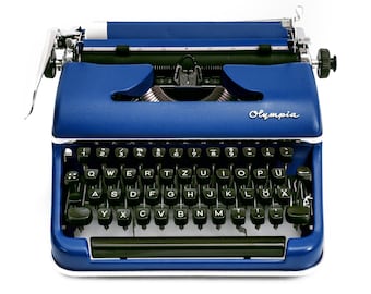 Olympia Splendid 33/66 Portable Typewriter in Blue With Matching