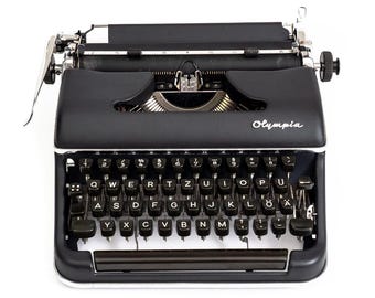 Macchina da scrivere Olympia nera, macchina da scrivere vintage, macchina da scrivere antica, macchina da scrivere nera revisionata, regalo per scrittori, macchina da scrivere Olympia SM2