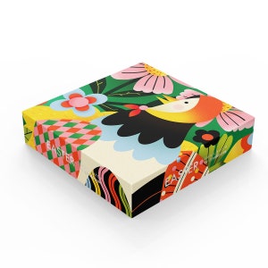 May include: A colorful box with a bird and flowers design. The box says "Easter" on the front and "Small Batch" on the side.