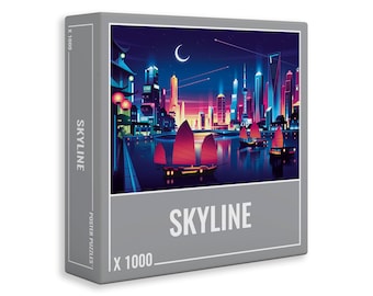 May include: A 1000 piece jigsaw puzzle featuring a colourful cityscape at night with a crescent moon in the sky. The puzzle box has the text "Skyline" and "Poster Puzzles" on the side.