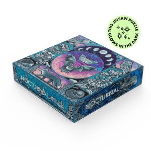 May include: A blue and purple jigsaw puzzle box with a nocturnal forest scene. The box features a bat, owl, fox, and other animals. The text "Nocturnal" is printed on the box. The box has a glow-in-the-dark feature.