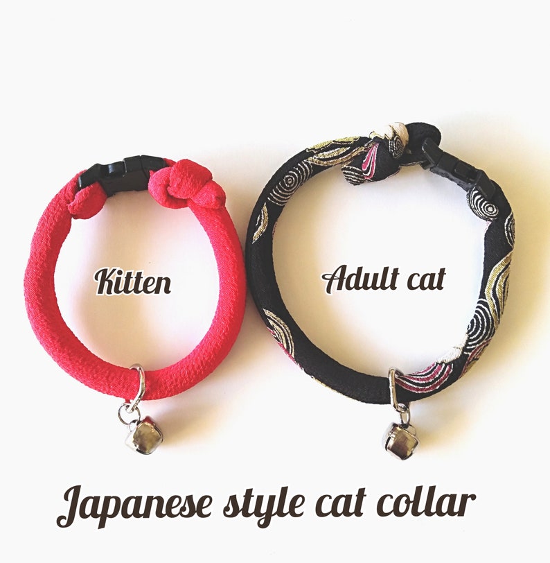 May include: Two Japanese-style cat collars, one red and one black with gold accents. The red collar is labelled "Kitten" and the black collar is labelled "Adult cat". Both collars have a silver bell attached.