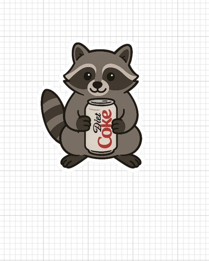 May include: A cartoon raccoon sticker holding a Diet Coke can. The raccoon is gray and white with a striped tail. The Diet Coke can is white with red lettering.