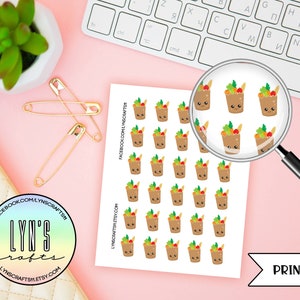 May include: A sheet of printed stickers featuring a cartoon illustration of a brown paper cup filled with colorful vegetables. The cup has a smiling face and the text "PRINTED" is visible at the bottom of the sheet.