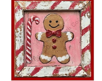 May include: A hand-painted wooden sign with a pink background features a gingerbread man with a red bow tie and a candy cane. The sign is framed with a white and red striped border.