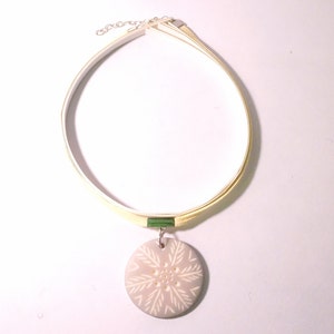 Blue Resin Pendant on a Cream Cord Choker