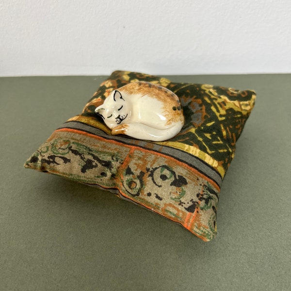 Vintage Art Pottery Sleeping Cat on a Textile Cushion Figurine