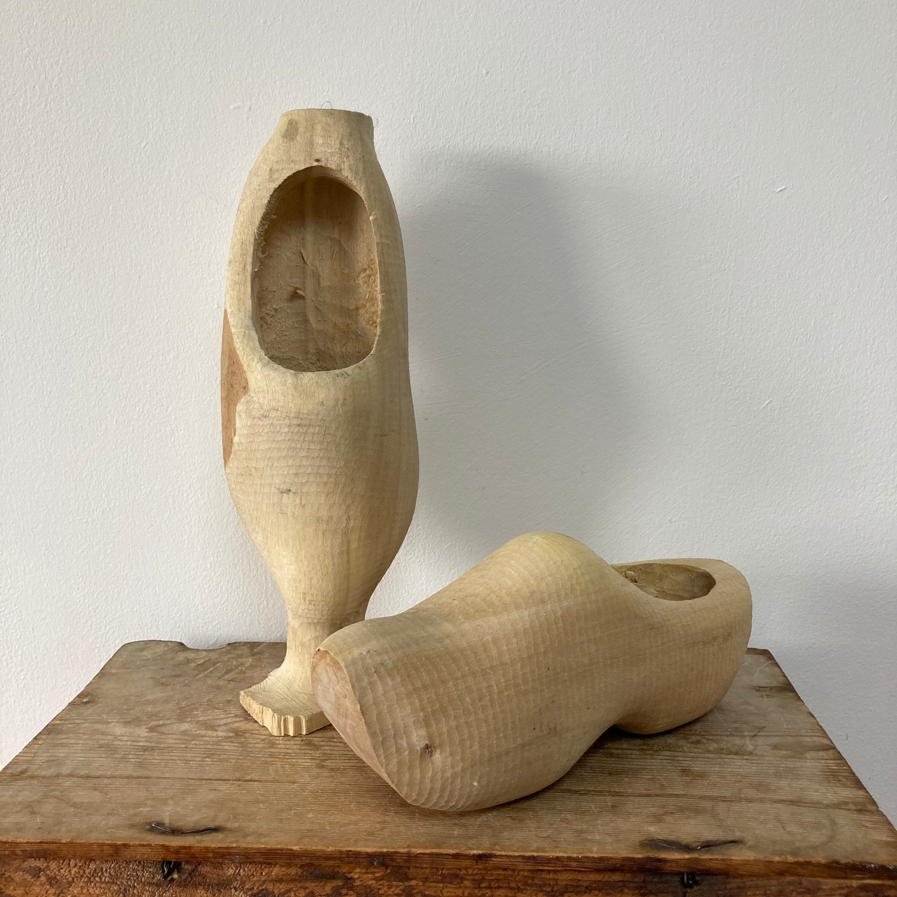Carved wooden best sale shoes