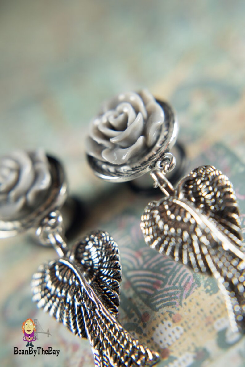 Gorgeous dangle angel wings plugs stainless steel single flare ear plugs 12 0g