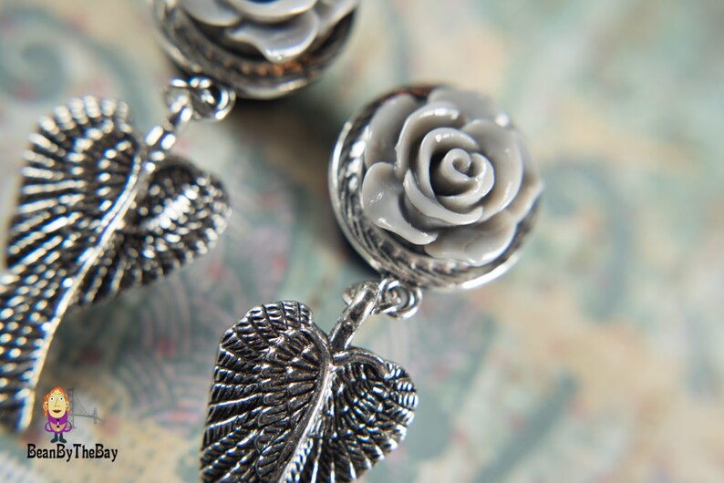 Gorgeous dangle angel wings plugs stainless steel single flare ear plugs 12 0g