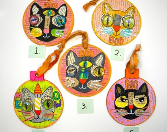 Halloween Cat Ornament - 4" Round Wood Circle with Painted Face, Collage Background and Wonky Glass Eyes