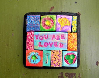 Mosaic wall art plaque with the positive affirmation You Are Loved
