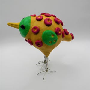 Whimsical Clay Bird Sculpture: Quirky Home Decor